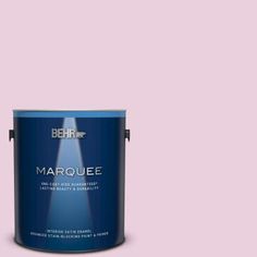 a pink paint with the words marquee on it and a blue canister