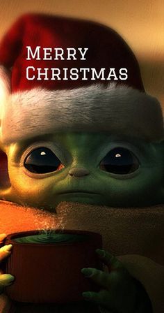 a christmas card with an image of baby yoda holding a red box and looking at the camera