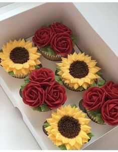 cupcakes with sunflowers and roses in a box