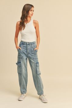 Cool in cargo, the Sylvie washed denim utility joggers are inspired by the perfect workwear style with a contemporary touch. • model is 5'4" and wearing a size small Care/Content: 98% cotton 2% spandex Denim Cargo Pants, Trendy Fits, Denim Cargo, Fabric Combinations, Denim Joggers, Workwear Fashion, Long Jeans, Cargo Joggers, Fashion Joggers