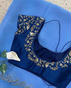 Hand embroidered ready made saree blouse with saree /blue crop top/stitched saree blouse usa /orgajza  saree blouse/modern blouse/zardosi blouse/blue organza saree blouse/ pure silk blouse/ silk saree with maggam work blouse        It is very true that a perfect blouse is the one which makes your saree look stand out !! If you find one of such a style that you have been wanting to have then dont let it go !! we carry such unique trending blouses that instantly add a stylish look to any saree !!     Well..!! we understand that you may not get in your desired size/pattern, here you go with customization according to your size/pattern which we can deliver in 1-2 weeks of time period !!      Here is a beautiful Hand embroidered zardosi work saree  in ice blue color that has golden shade cutwor Traditional Blue Pre-draped Saree With Floral Embroidery, Blue Silk Pre-draped Saree With Floral Embroidery, Blouse For Blue Saree, Organza Blouse With Dori Work For Festivals, Organza Blouse With Floral Embroidery For Festivals, Festival Organza Blouse With Dori Work, Blue Raw Silk Saree With Unstitched Blouse, Embroidered Organza Blouse For Diwali, Floral Embroidered Organza Saree Blouse