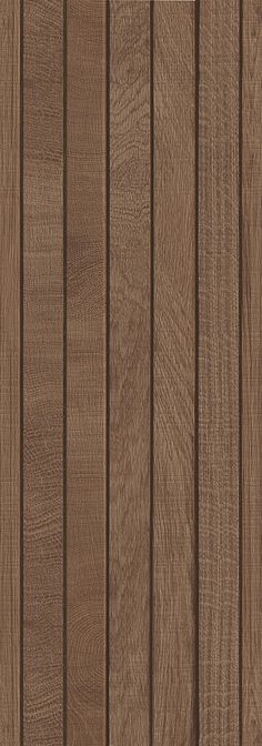 a close up view of the wood grains on an exterior wooden door that is brown and has vertical slats