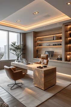 an office with a desk, chair and bookcases in front of large windows