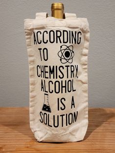 a white bag with black writing on it that says according to chemistry alcohol is a solution