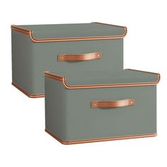 two grey storage boxes with copper handles