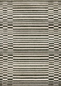 a black and white rug with vertical stripes