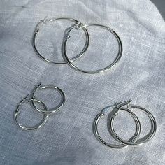 SHIPPING IN THE NEXT DAY! 🎉 These bright and lightweight .925 Sterling Silver hoop earrings will be a perfect touch of your style. All hoops are sold in pairs. Nickel Free & Hypoallergenic & Lightweight * .925 Sterling Silver Hoops. They are hypoallergenic, safe for sensitive ears. *3 sizes available Hoop Earrings Sizes: 18mm, 23mm, 33mm. Hoop Earrings Width: 2mm -Small Hoop Earrings 18mm -Medium Hoop Earrings 23mm - Large Hoop Earrings 33mm Materials: .925 Sterling Silver / Solid Silve Silver Hypoallergenic Dangle Hoop Earrings, Hypoallergenic Silver Hoop Earrings, Small Silver Stainless Steel Hoop Earrings, Small Silver Hoop Earrings, Tarnish Resistant, Small Silver Punk Hoop Earrings, Thick Gold Hoop Earrings, Small Silver Hoop Earrings, Thick Hoop Earrings, Medium Hoop Earrings