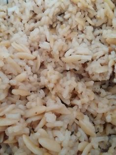 rice is being cooked in a pan on the stove