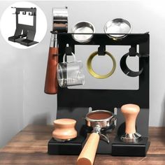 an assortment of kitchen utensils on a wooden table