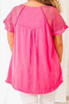 Because we know that you will love this top as much as we do! This top, in bold hot pink, features a unique frayed hemline and delicate crochet detailing! Elevate your style with this eye-catching piece and stand out from the crowd! Perfect for adding a pop of color to your wardrobe! 55% Linen, 45% Cotton Pink V-neck Crochet Top For Spring, Pink Lace Top With Ruffles For Spring, Spring Short Sleeve Tops With Fringe, Beach Tops With Frayed Hem And Short Sleeves, Short Sleeve Beach Tops With Frayed Hem, Frayed Hem Short Sleeve Tops For Beach, Pink Bohemian Lace Top, Pink Bohemian Blouse With Lace Top, Bohemian Pink Lace Top Blouse