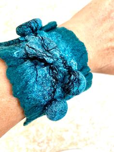 Handmade Wool bracelet. Felted  beautiful  wrist  cuff/bracelet. Elegant wool jewelry is beautiful and one of kind. Handmade  natural  bracelet is warm and soft.  I created it from merino wool 100% in wet felting technique in my pet-and smoke-free studio. In this bracelet I used Shibori technique to create unique felt texture. Such an accessory will be both a great addition for your look and wonderful gift idea. Length: about 9.0 inches Width: about 2.5 inches For wrist circumference approximate Wool Bracelet, Wool Jewelry, Felt Texture, Felt Bracelet, Boho Style Bracelets, Shibori Techniques, Cuff Bracelets Handmade, Wool Art, Art Texture