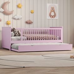 a child's bedroom with pink furniture and stars on the wall