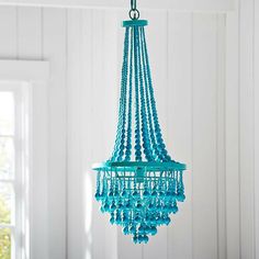 a blue chandelier hanging from the ceiling