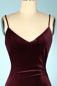 If you are a big fan of sultry sexy Hitchcock blondes, don't miss this burgundy holiday dress! This velvet holiday dress features spaghetti straps and a V neck line in a tight fit bodice that smoothly goes down, hugging your figure, putting the emphasis on your curves and enhancing them to create a sultrier figure until it reaches the floor in a maxi skirt with a slit that will allow your beautiful legs to peek through, giving you an air of mystery and sexyness you never even thought possible! S Burgundy Holiday Dress, Velvet Dress Sleeveless, Velvet Holiday Dress, Prom Dress Burgundy, Burgundy Bridesmaid Dresses Long, Elegant Wine, Lace Burgundy Dress, High Neck Bodycon Dress, Velvet Slip Dress