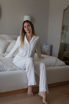 Our Ruffle Pajama Set is the perfect blend of comfort and style. Crafted from sustainable bamboo fabric, known for its incredible softness, breathability, and eco-friendly qualities, this set offers the ideal mix of luxury and sustainability. Whether you're treating your bridesmaids or simply updating your own sleepwear, we promise this set will quickly become a favorite you won’t want to put away. This is also a beautiful gift for a bride to be or wedding morning getting ready look. Bamboo fabr Wedding Morning Getting Ready, Bride Getting Ready Outfit, Bridal Pants, Bamboo Pants, Bridal Pajamas, Gift For A Bride, White Bridal Dresses, Wedding Morning, Getting Ready Wedding