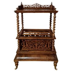 an antique wooden bed frame with intricate carvings