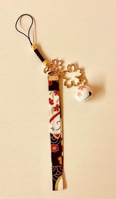 Item Title Description About This Items This listing is for 1 piece of Japanese Netsuke Keychain, Cerry blossom & Maneki Neko Lucky cat pattern with Sakura ball.   Maneki neko is printed on string. It is perfect for decorating your bags, purses, luggage, and cell phones. Please enjoy as you like! Condition New Shipping We will ship the item by airmail(Japan Post) with a tracking number(about 11 to 23days)   Shipping is only available to the address registered in eBay. If you want us to send another address, please change your address on eBay and then place an order. Shipping is available from Monday to Friday. Weekends are not available because freight (shipping) companies are closed. We do not mark merchandise values below value or mark items as “gifts” – Japan, US and International gover Cat Cherry Blossom, Japanese Keychain, Japanese Netsuke, Strap Keychain, Handmade Keychains, Maneki Neko, Lucky Cat, Beaded Keychains, Japan Post