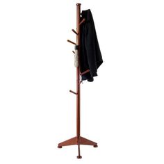 a coat rack with two coats hanging from it's sides and one coat on top