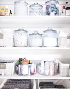 an open refrigerator filled with lots of different types of items and containers on the shelves