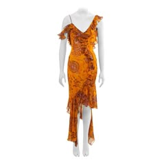 ▪ John Galliano evening dress ▪ Spring-Summer 2003 ▪ Crafted from silk chiffon in a vibrant saffron hue, featuring a batik-dyed outsized paisley print ▪ The neckline, shoulder straps, and bodice are adorned with a delicate ruffled trim ▪ Boasting a flounced, asymmetric high-low skirt ▪ Designed with a v-neck and low back ▪ Lined with matching silk chiffon ▪ FR38 - UK10 - US4/6 ▪ Made in France The photographs presented in this listing, with the exception of any reference or runway imagery, requi Chic Spring Dresses, Summer Silk Dress With Paisley Print, Yellow Bohemian Evening Dress, Bohemian Yellow Evening Dresses, 00s Style, Silk Evening Dress, Fashion Aesthetics, Silk Print Dress, Different Dresses