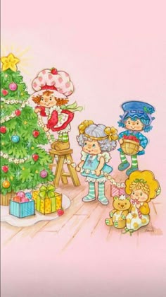 children decorating a christmas tree in front of a pink wall with presents on it