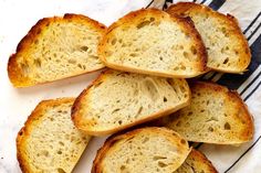 slices of bread sitting on top of a towel