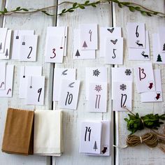 the table is covered with cards and numbers