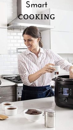 a woman standing in front of an air fryer with the words smart cooking on it