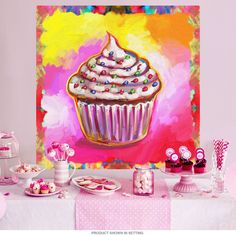 a painting of a cupcake with white frosting and sprinkles on it