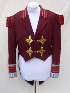 "Mens Medium , Upcycled red ringmaster , greatest showman tailcoat . Would fit a women size UK 20 ,US 16 Made from a mens ' Debenhams  ' red woollen jacket. It also has gold applique  and gold buttons.  Measures chest 116 cm (45.5 \") Waist 106 cm (41.5 \") shoulder to hem front 51.5 cm full length back 101 cm sleeve length 63 cm top sleeve width 21.5 cm shoulder seam 17.5 cm across front 43.5 cm (across back 49 cm ) all the way around armhole 56.5 cm  Can post quickly if needed by a certain dat Red Fitted Blazer For Costume Party, Fitted Red Ceremonial Outerwear, Fitted Red Outerwear For Ceremonial Occasions, Matilda Costume, Bespoke Jacket, Steampunk Festival, Gold Applique, Pinstripe Suit, Character Outfits