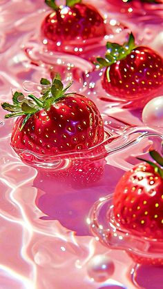 some strawberries are floating in the water