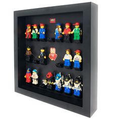 lego minifigure display in black shadow box on white background