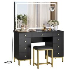 a vanity with a mirror and two stools