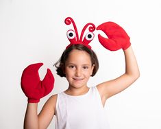 Add a touch of fun to your Halloween or costume party with our Crab Costume Accessory Set! This set includes cozy polar fleece gloves and a headband with eye-catching crab eyes and antennae. The eyes are removable for easy washing. You can choose from a range of colors in the drop-down menu to find the perfect fit for your little crab. Whether you're dressing up for a holiday event or just for playtime, this Crab Costume Set is the perfect addition to your costume collection. For more headbands please check out this section here: https://www.etsy.com/shop/oKidz?section_id=15482496 Crab Costume Women, Crab Costume, Hand Marbled Paper, Ladybug Costume, Elegant Gift Wrapping, Crab Claws, Fleece Gloves, Plastic Headband, Costume Set