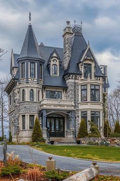 an old victorian style house with turrets and windows