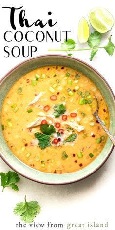 thai coconut soup in a bowl with limes and cilantro on the side