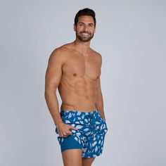 Model's height: 183cm/6'0", Model is wearing: Medium Collins is our premier and most iconic swim short. The Built-in liner is super soft, supportive and 100% chafe-free. No more mesh, just comfort. Available in Shirt- Autumn Blue Blue Swimwear With Built-in Shorts For Swimming, Blue Swimwear With Built-in Shorts For Surfing, Blue Short-length Swimwear For Poolside, Swimwear With Built-in Shorts For Poolside Warm Weather, Blue Moisture-wicking Swimwear For Swimming, Beachwear Blue Short Swim Trunks, Blue Short Swimwear For Swimming, Blue Summer Swim Shorts, Blue Moisture-wicking Swimwear