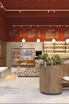 the interior of a bakery with bread and pastries