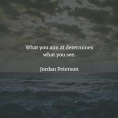 an ocean with the words, what you aim at determines what you see jordan peterson