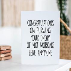 a card that says congratulationss on pursuing your dream of not working here anymore