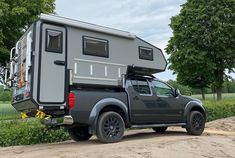 a truck with a camper attached to the back