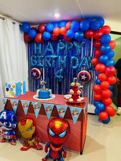 a birthday party with balloons and decorations