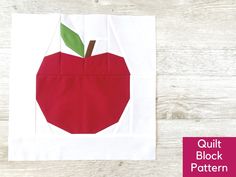 a piece of paper with an apple on it and the words quilt block pattern below