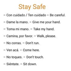 an orange and white sign with words on it that say, stay safe con cuado / ten cuado - be careful