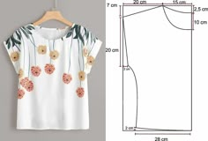 an image of a women's blouse with flowers on it and measurements for the top