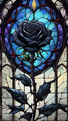 a stained glass window with a rose in it