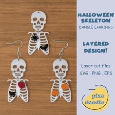 three skeleton earrings with halloween decorations hanging from them on a wooden table next to an advert