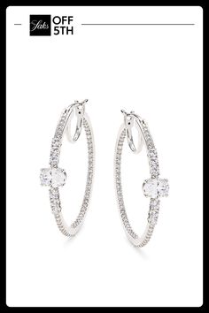 A Pair Of Sparkling Hoop Earrings Made From Rhodium-Plated Brass And Studded With Cubic Zirconia. Cubic Zirconia Rhodium-Plated Brass Hinge Back Imported Size Drop, About 1.25" Click Here For A Guide To Jewelry & Watches. Center Core - W Jewelry > Saks Off 5th. Adriana Orsini. Formal Silver Hoop Earrings With Halo, Silver Halo Hoop Earrings, Vs Clarity Cubic Zirconia Hoop Earrings, Silver Small Hoop Earrings With Halo, Sparkle Hoop Earrings, Cubic Zirconia Hoop Earrings, Brass Hinges, Fashion Jewelry Earrings, Rhodium Plated