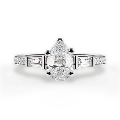 an oval and baguette cut diamond engagement ring