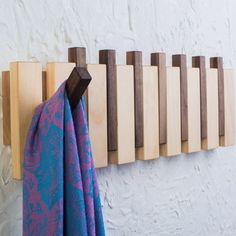 the coat rack is made out of wood